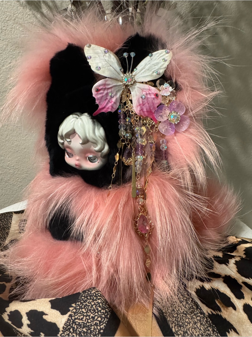 Whimsical Pink & Black Fur Skullpanda Bag charm with Butterfly Accent